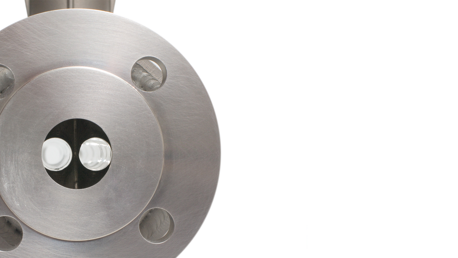 Close-up image of a straight tube Coriolis mass flow sensor